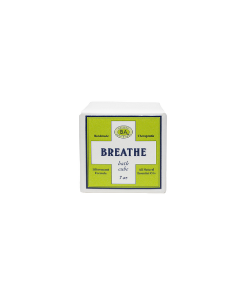 Baudelaire Breathe bath cube in a white package with a bright green label, indicating natural ingredients.