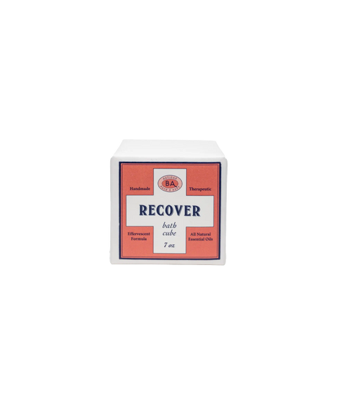 Baudelaire Recover bath cube in a white package with a red label, indicating natural ingredients.