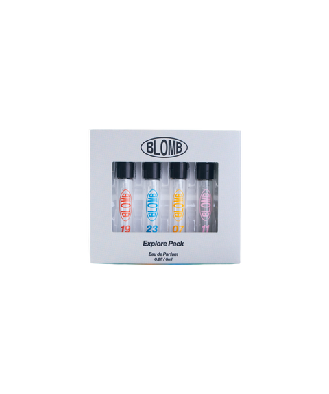 BLOMB Explore Pack 4-piece perfume sample kit in a white box with a clear window.