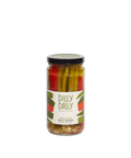 A glass jar of Dilly Dilly Provisions pickled dilly beans with a black lid.