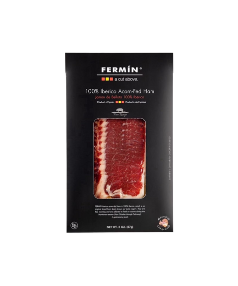 Fermin 100% Iberico Acom-Fed Ham in a  black package with a clear window displaying the sliced red and white ham inside.