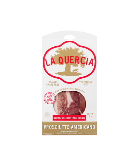 A package of La Quercia Prosciutto Americano, featuring a white package with a red and gold logo, and a clear window displaying the sliced meat.