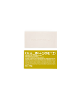 Malin+Goetz Vitamin B5 hydrating soap bar in rum scent above its yellow product box.