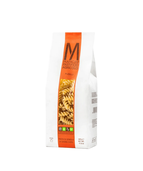 A bag of Mancini Pastifico Agricolo fusilli pasta with a clear window revealing pasta inside.