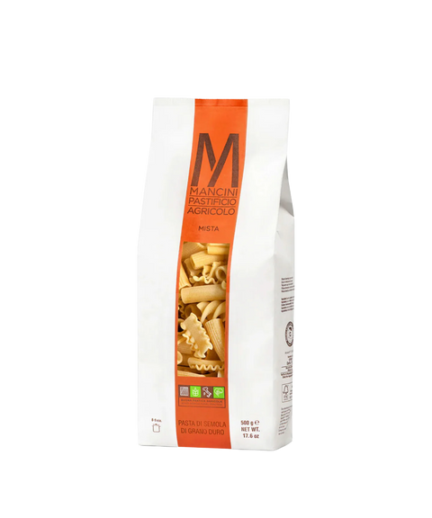 A bag of Mancini Pastifico Agricolo mista mixed pasta with a clear window revealing pasta inside.