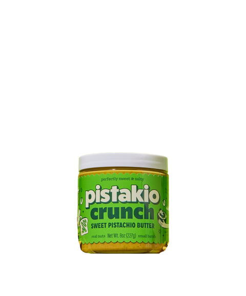 Jar of Pistakio pistachio crunch with a green label and white lid.