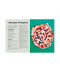 Slice cookbook opened to a spread titled 'Aubergine Parmigiana' with the recipe on the left and a photo of a round pizza on a green surface on the right.